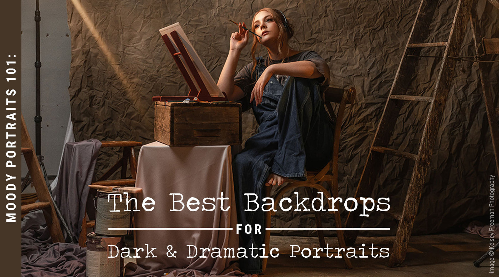 Woman in a dark outfit sitting in a studio with text about the best backdrops for dark and dramatic portraits.